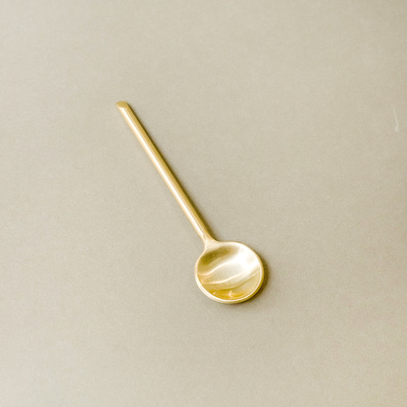 Mini gold spoon